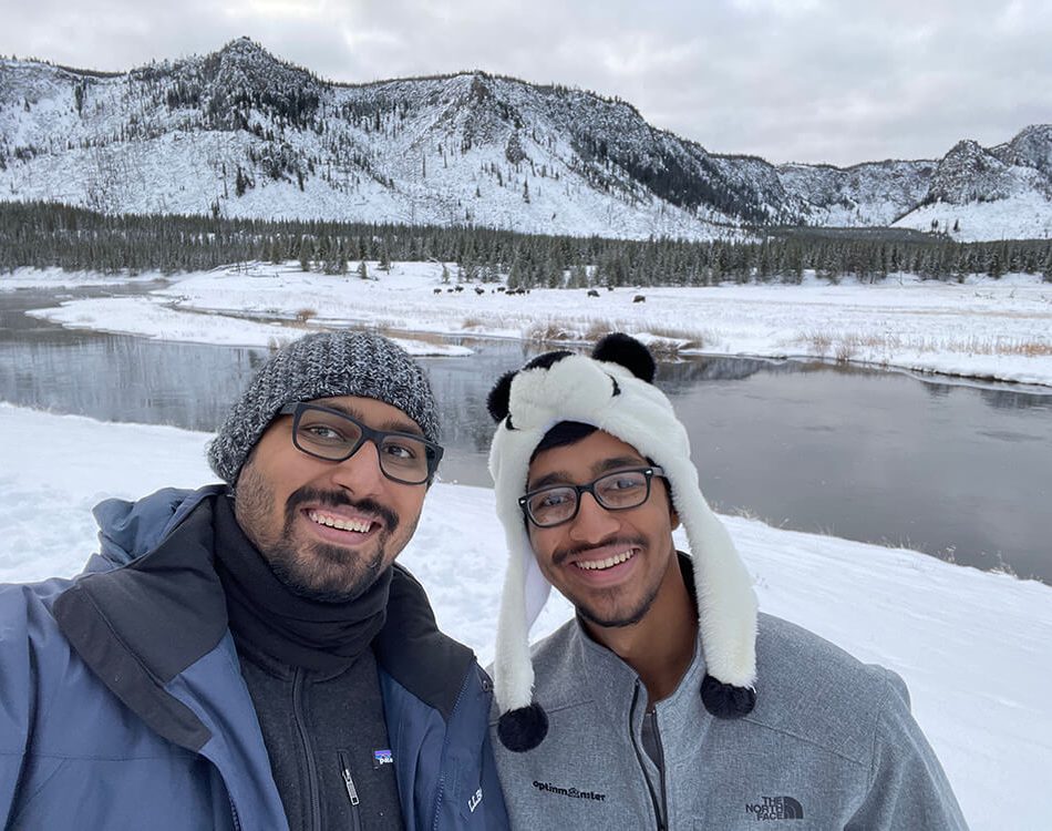 Fun photo with Zain at Yellowstone - Bison herd in background