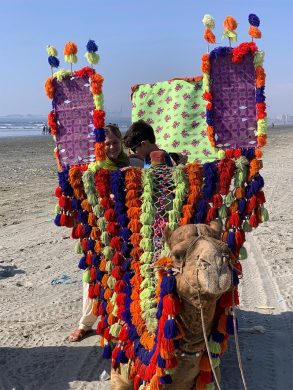 Solomon experiencing Camel Ride at Clifton Beach