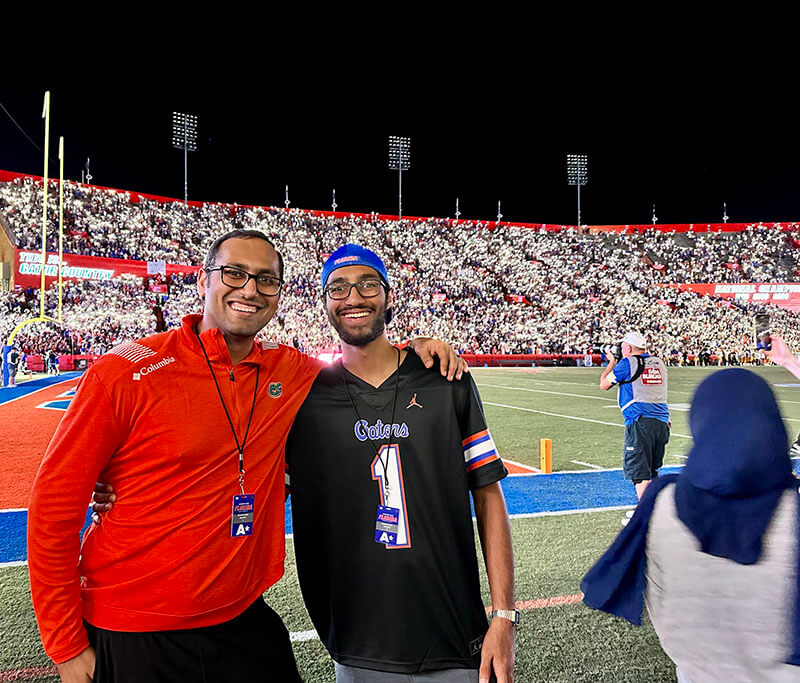 Syed and Zain - UF Football Game on Field 3rd quarter