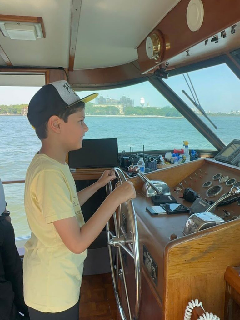 Solomon Driving Boat in NYC